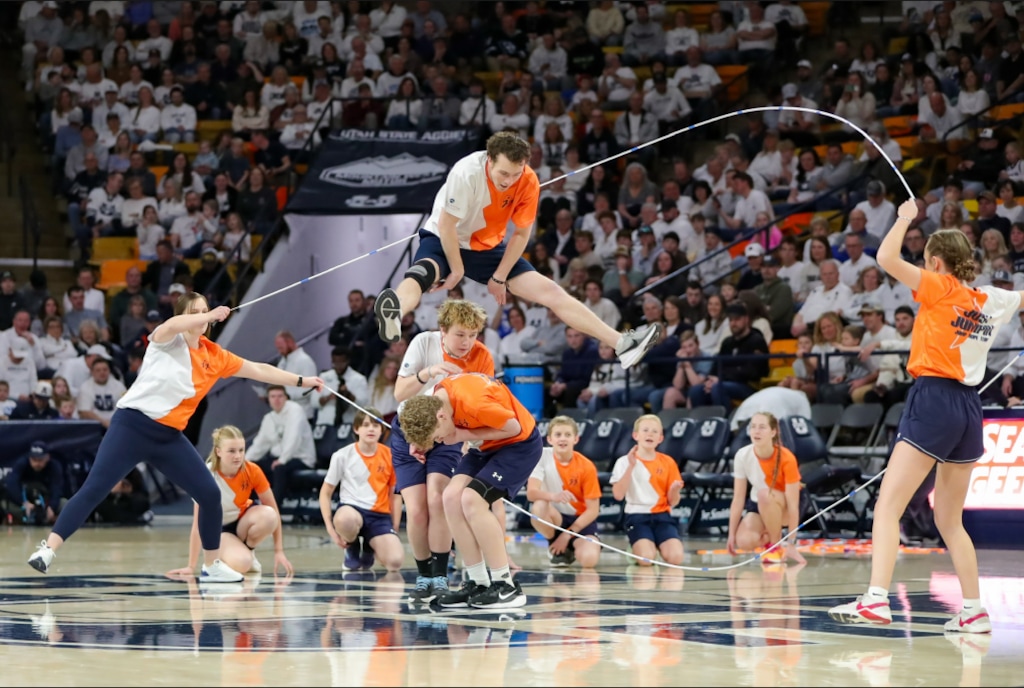 (Kathryn Ozmun) Members of the jump rope team Just Jumpin' performs acrobatic double Dutch stunts at Utah State University.