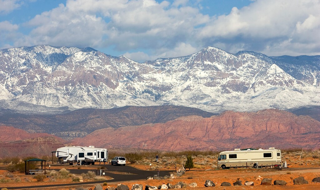 (Al Hartmann |  Tribune file photo) RV campers beneath the snowy Pine Mountains at Sand Hollow Reservoir in Washington County.