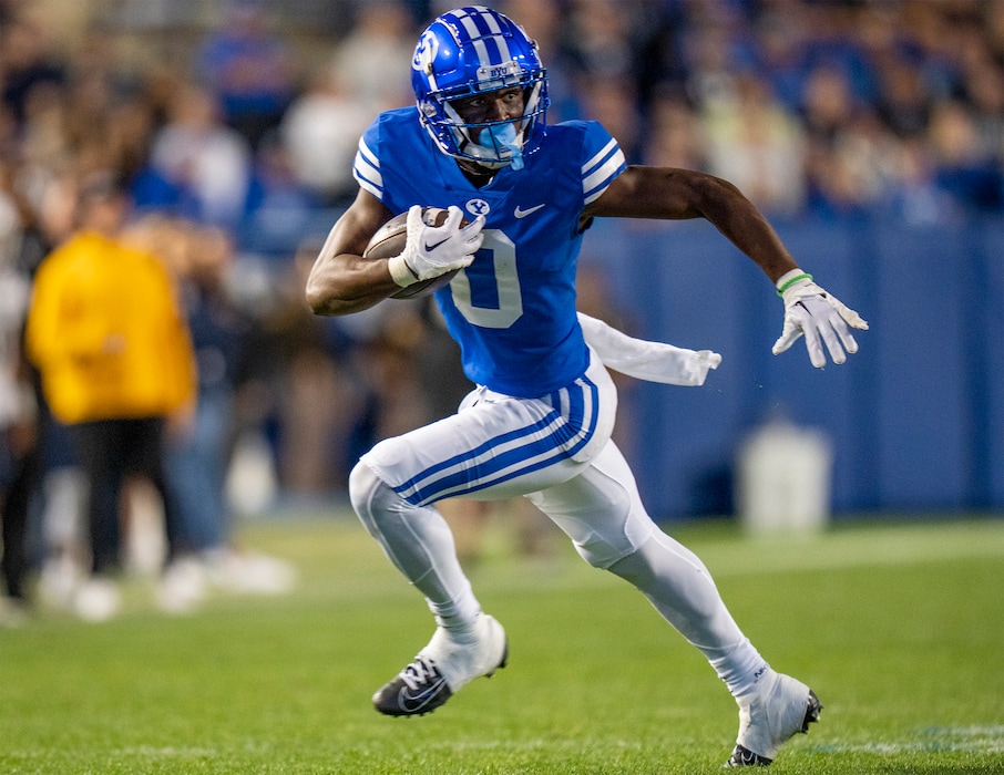 (Rick Egan | The Salt Lake Tribune) Brigham Young Cougars wide receiver Kody Epps (0) runs with the ball, in football action between the Brigham Young Cougars and the Utah State Aggies, at LaVell Edwards Stadium in Provo, on Thursday, Sept. 29, 2022.