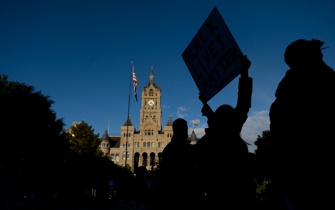 (Leah Hogsten  |  The Salt Lake Tribune) Demonstrators marched from the Utah Capitol down State Street, stopping at every intersection for five minutes in honor of George Floyd, June 8, 2020.