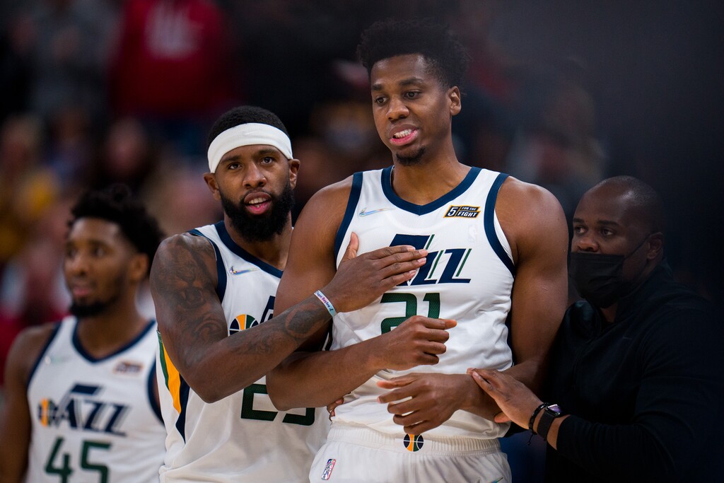 (Trent Nelson | The Salt Lake Tribune) Denver Nuggets forward JaMychal Green (0) and Utah Jazz center Hassan Whiteside (21) tussle and are both ejected as the Utah Jazz host the Denver Nuggets, NBA basketball in Salt Lake City on Tuesday, Oct. 26, 2021. Utah Jazz forward Royce O'Neale (23)