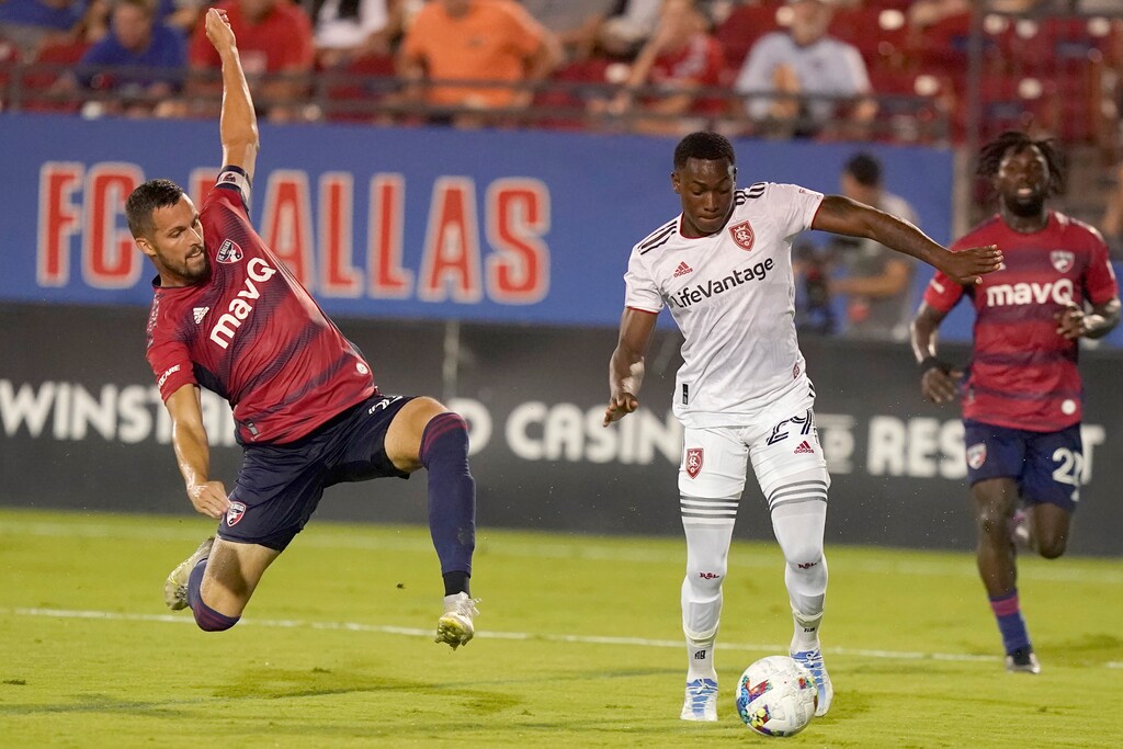 (LM Otero | AP) Real Salt Lake midfielder Anderson Julio (29) makes a run on the goal as FC Dallas defender Matt Hedges (24) comes in during the second half of an MLS soccer match Saturday, Aug. 27, 2022, in Frisco, Texas.