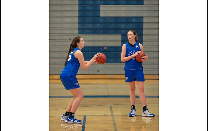 (Francisco Kjolseth  | The Salt Lake Tribune) Fremont girls basketball players Emma Calvert, left, and Maggie Mendelson listen to instruction during a recent practice. The team is a top 15 program in the country, per MaxPreps, and is led by 3 highly recruited girls including Calvert and Mendelson.