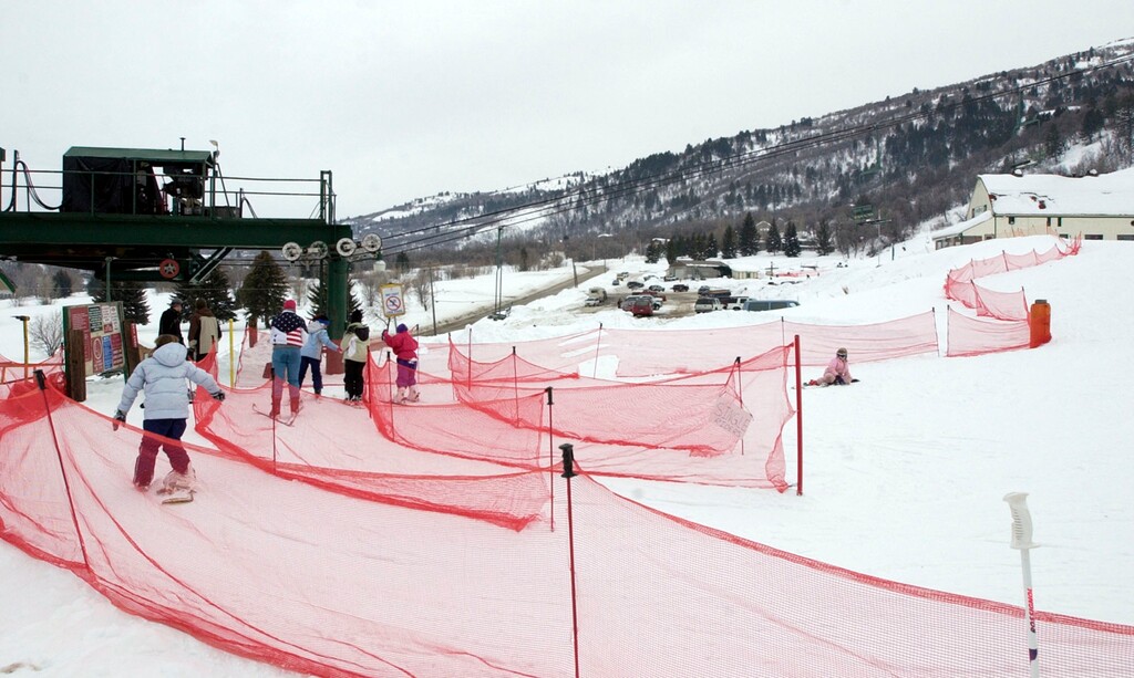 (Danny Chan La | The Salt Lake Tribune) This 2001 file photo shows Troll and Viking lifts at Nordic Valley carrying skiers up the slopes above Eden in Ogden Valley.  The 140-acre ski area, known as a place for beginning skiers, could see a major expansion into the Uinta-Wasatch-Cache National Forest under a proposal by its new operator, Colorado-based Mountain Capital Partners.