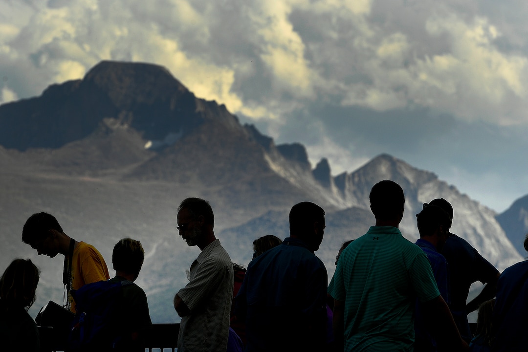 (Helen H. Richardson  |  The Denver Post) Tourists stop at Many Parks Curve to see the spectacular mountainous setting in Rocky Mountain National Park on August 5, 2018, in Estes Park, Colorado. The overlook is along Trail Ridge Road the stretch of highway that traverses Rocky Mountain National Park from Estes Park, Colorado in the east to Grand Lake in the west. The road gains in elevation as you drive from Estes Park reaching a hight point of 12, 183 feet just past the Lava Cliffs before descending to Grand Lake. At all elevations, the drive on Trail Ridge Road is a memorable adventure. The road is also known as Trail Ridge Road/Beaver Meadow National Scenic Byway. The road is closed during the winter, and often remains closed until late spring or early summer depending on the snowpack. It requires access to Rocky Mountain National Park even for local residents.