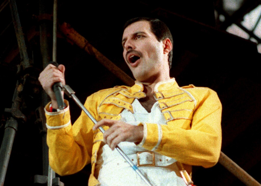 (Marco Arndt | AP file photo) In this July 20, 1986 file photo, Queen lead singer Freddie Mercury performs in Germany.