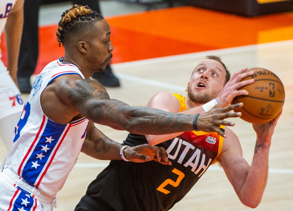 (Rick Egan | The Salt Lake Tribune) Utah Jazz forward Joe Ingles (2) looks for a shot as Philadelphia 76ers center Dwight Howard (39) defends, in NBA action between the Utah Jazz and the Philadelphia 76ers at Vivint Arena, on Monday, Feb. 15, 2021.