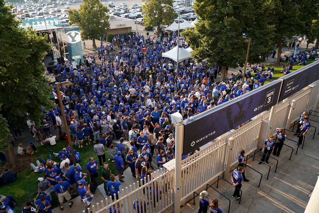 (George Frey | AP) BYU fans enter LaVell Edwards Stadium before an NCAA college football game against Baylor, Saturday, Sept. 10, 2022, in Provo.