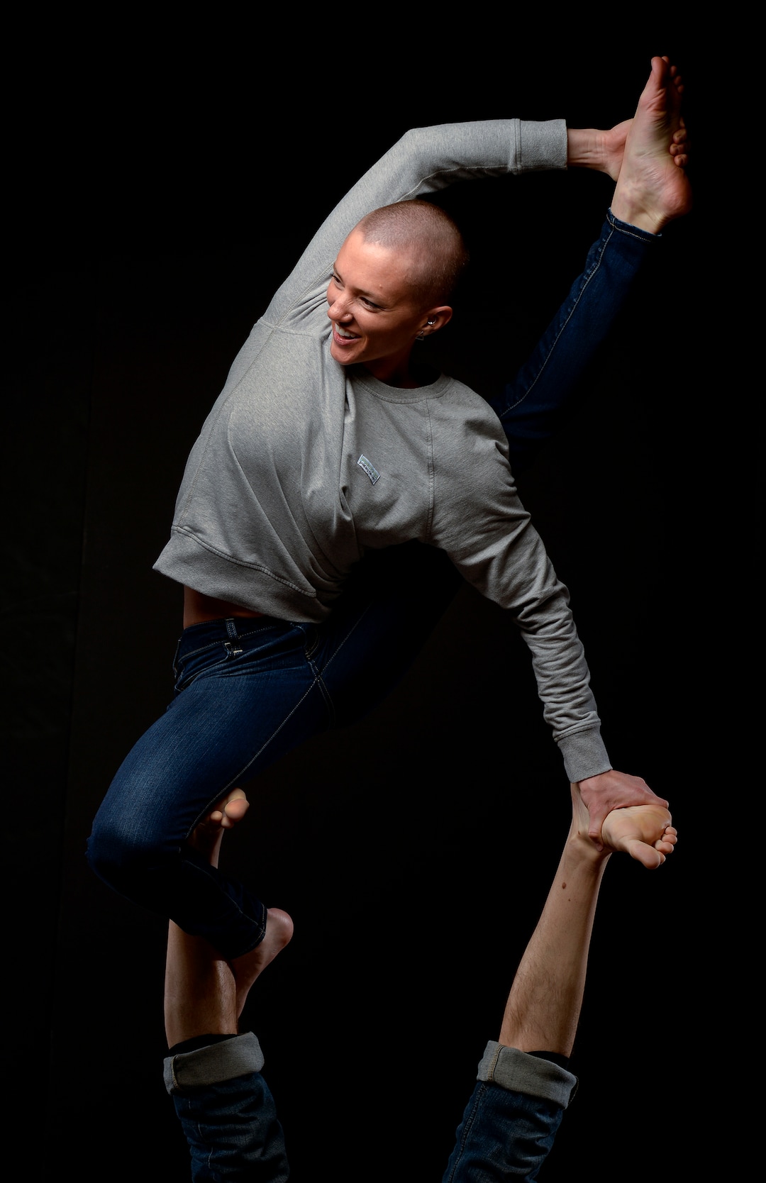 Leah Hogsten  |  The Salt Lake Tribune  Ashlee Conlin's gymnastics career made the transition to acroyoga a natural move with her established athleticism. Conlin is lifted by fellow acroyoga community member and friend Matt Talbert. Acroyoga is a blend of acrobatics and yoga movements that can be performed with a duo, trio and quad group of people. The owner of a Utah acroyoga studio has filed a defamation/ libel lawsuit against several members of the acroyoga community including Conlin, Talbert and Moore-Barcus.