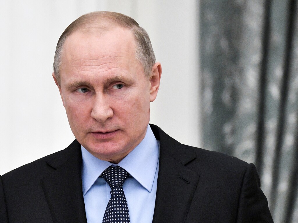 (Alexei Nikolsky | Sputnik | Kremlin Pool Photo | The Associated Press) In this photo taken Monday, Jan. 29, 2018, Russian President Vladimir Putin attends the ceremony of signing a 2018-20 general agreement between Russian trade unions, employers and the Russian government in Moscow. The Trump administration late Monday released a long-awaited list of 114 Russian politicians and 96 "oligarchs" who have flourished under Putin, fulfilling a demand by Congress that the U.S. punish Moscow for interfering in the 2016 U.S. election.
