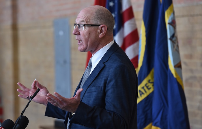 (Francisco Kjolseth  |  The Salt Lake Tribune)  Rep. Steve Handy makes a few remarks during the ceremony marking the return of the bell from the USS Utah, one of the first ships lost during the attack on Pearl Harbor on Dec. 7, 1941. The refurbished bell is back on display in the Naval Science building at the university along with a few artifacts recovered from the ship. 
