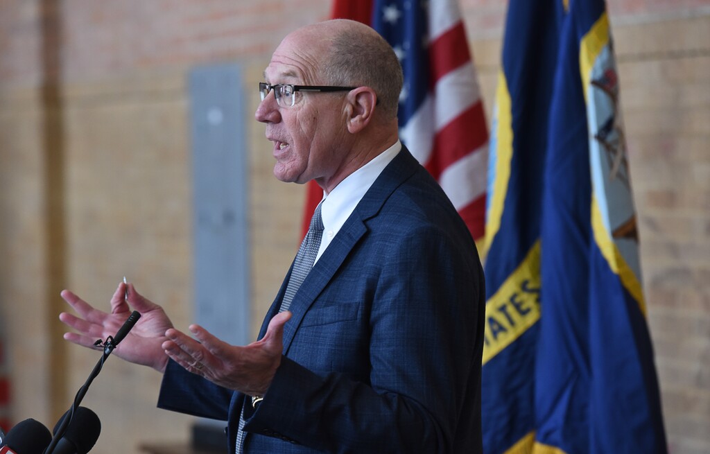 (Francisco Kjolseth | The Salt Lake Tribune) Rep. Steve Handy makes a few remarks during the ceremony marking the return of the bell from the USS Utah, one of the first ships lost during the attack on Pearl Harbor on Dec. 7, 1941. The refurbished bell is back on display in the Naval Science building at the university along with a few artifacts recovered from the ship.
