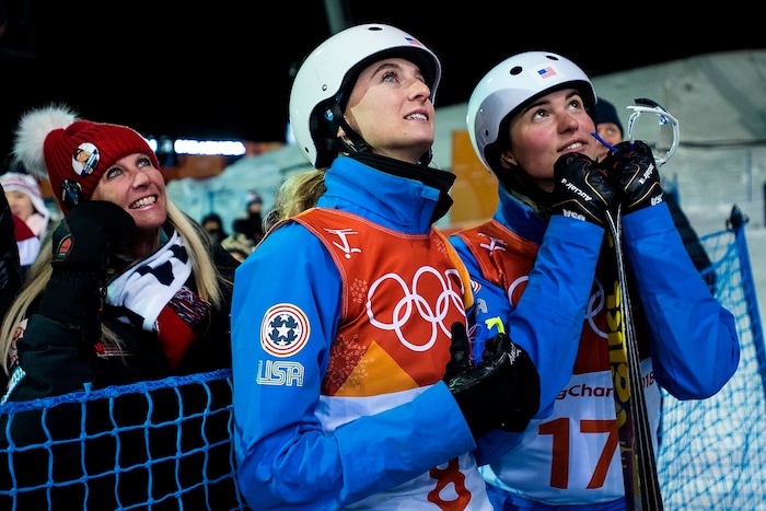 (Chris Detrick  |  The Salt Lake Tribune)  USA Kiley McKinnon, left, and USA Madison Olsen watch the final run to see if Olsen would qualify for the finals during the Ladies' Aerials Qualification at Phoenix Park during the Pyeongchang 2018 Winter Olympics Thursday, Feb. 15, 2018.  