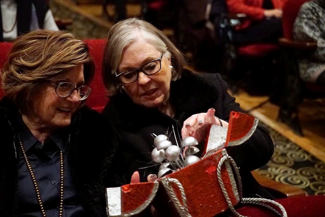 (Photo courtesy Utah Opera) Visually impaired patrons feel part of a costume at a dress rehearsal for Utah Opera's production of Mozart's "The Magic Flute" at Salt Lake City's Capitol Theatre on Wednesday, March 6, 2019. Utah Opera, the Moran Eye Center and the Utah Council for the Blind organize the annual event for visually impaired opera fans.