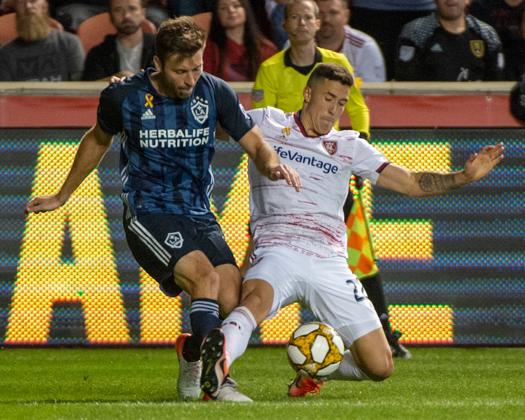 (Rick Egan  |  The Salt Lake Tribune)      Los Angeles Galaxy defender Dave Romney (4) collides with Real Salt Lake defender Tony Beltran (2), in MLS soccer action between Real Salt Lake and Los Angeles Galaxy at Rio Tinto Stadium, Wednesday, Sept. 25, 2019.