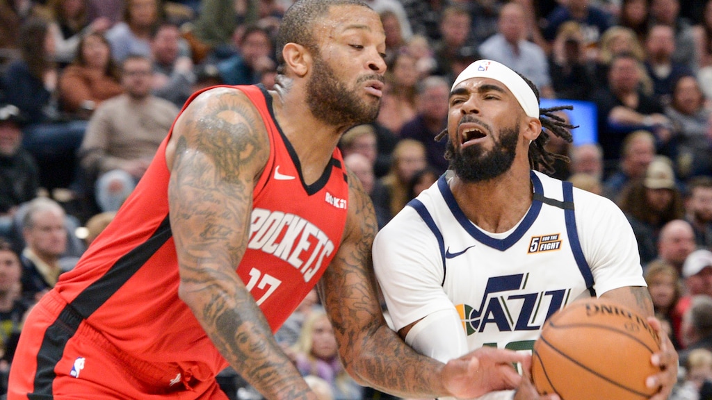 (Leah Hogsten  |  The Salt Lake Tribune) Utah Jazz guard Mike Conley (10) rounds the defense of Houston Rockets forward P.J. Tucker (17).  The Utah Jazz host the Houston Rockets at Vivint Arena, Feb. 22, 2020.