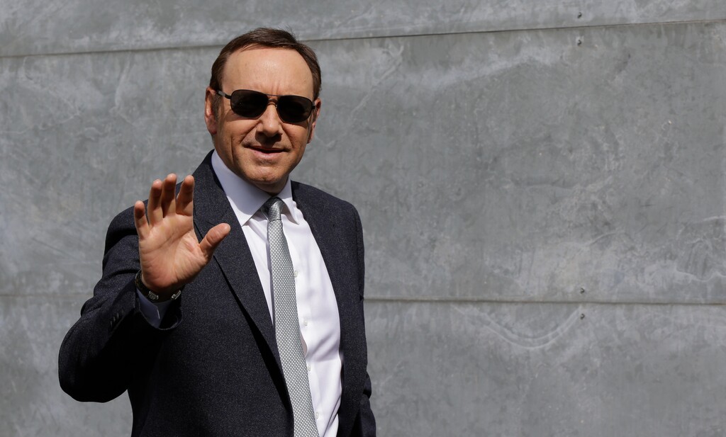 (Luca Bruno | The Associated Press) In this file photo dated Tuesday, June 21, 2016, actor Kevin Spacey waves as he arrives to attend the Giorgio Armani men's Spring-Summer 2016-2017 fashion show in Milan, Italy.  British police have disclosed Wednesday July 4, 2018, that they are now investigating six claims of alleged sexual assault or assault, by Academy Award-winning actor Kevin Spacey, three more than previously disclosed.
