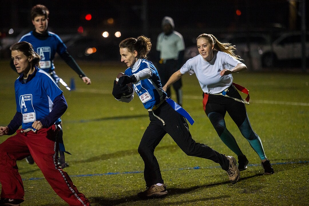 (Chris Detrick  |  The Salt Lake Tribune) Team A Lot's Leslie Hadfield runs the ball during the flag football team game against Sim Team at North University Fields in Provo Thursday, November 30, 2017.  