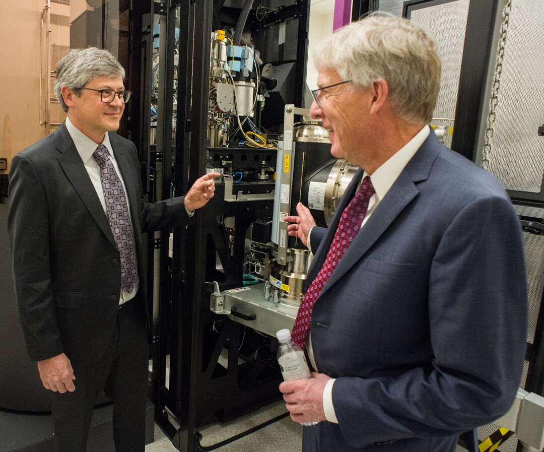 (Rick Egan  |  The Salt Lake Tribune)     Markus Babst, Interim director of Eyring Center for Cell and Genome Science And Professor of Biology visits with Henry White, Dean of the College of Science, at the opening of the new Gary and Ann Crocker Science Center at the University of Utah, Thursday, April 19, 2018.