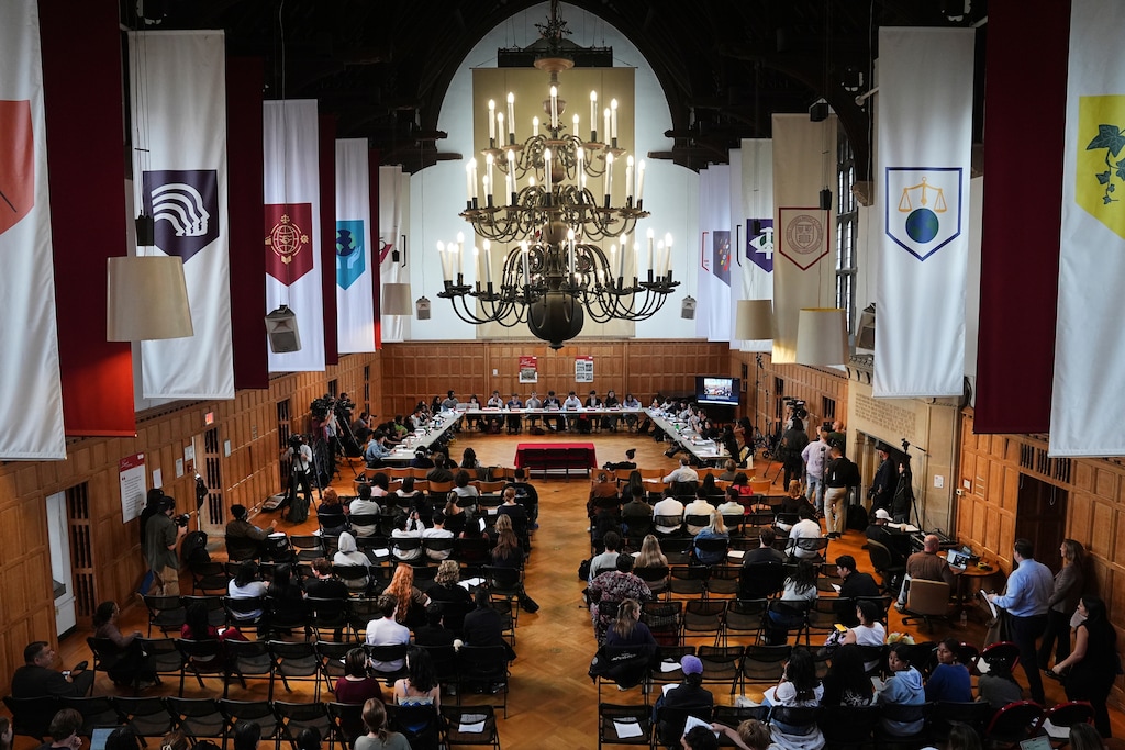 People gather prior to a hearing on sexual assault on campus at Cornell University in Ithaca, N.Y., Thursday, Oct. 1, 2026. (AP Photo/Matt Rourke)