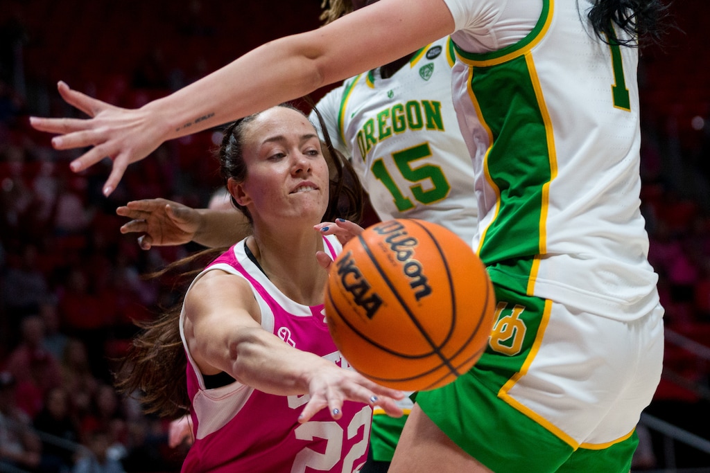 (Trent Nelson  |  The Salt Lake Tribune) Utah Utes forward Jenna Johnson (22) passes the ball as Utah hosts Oregon, NCAA basketball in Salt Lake City on Sunday, Feb. 11, 2024.