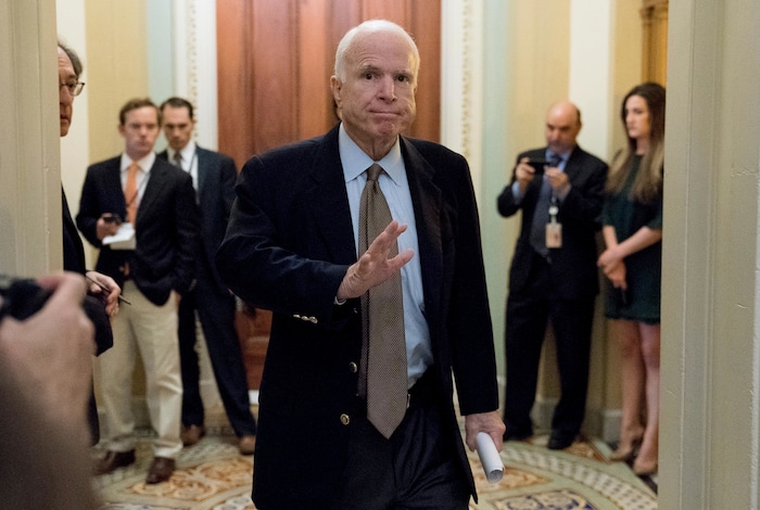 FILE - In this June 22, 2017, file photo, Sen. John McCain, R-Ariz., arrives for a Senate Republican meeting on a health reform bill on Capitol Hill in Washington. McCain sent shockwaves through the Senate early Friday morning, July 28 when he cast the deciding vote rejecting the GOP's heath care effort to repeal and replace the Affordable Care Act. Reaction in red state Arizona has been more muted. McCain returned to the Senate earlier this week after being diagnosed with brain cancer. Despite making a decisive vote for opening debate on the measure, the Arizona senator's ultimate "no" vote effectively killed the legislation called the "skinny repeal" bill. (AP Photo/Andrew Harnik, File)