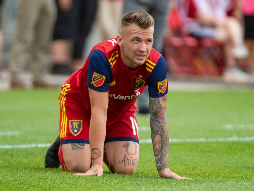 (Rick Egan  |  The Salt Lake Tribune)  Real Salt Lake midfielder Albert Rusnak (11) is slow to get to his feet after being knocked to the ground hard, in MLS action between Real Salt Lake and Sporting Kansas City, in Sandy, Saturday, June 29, 2019.