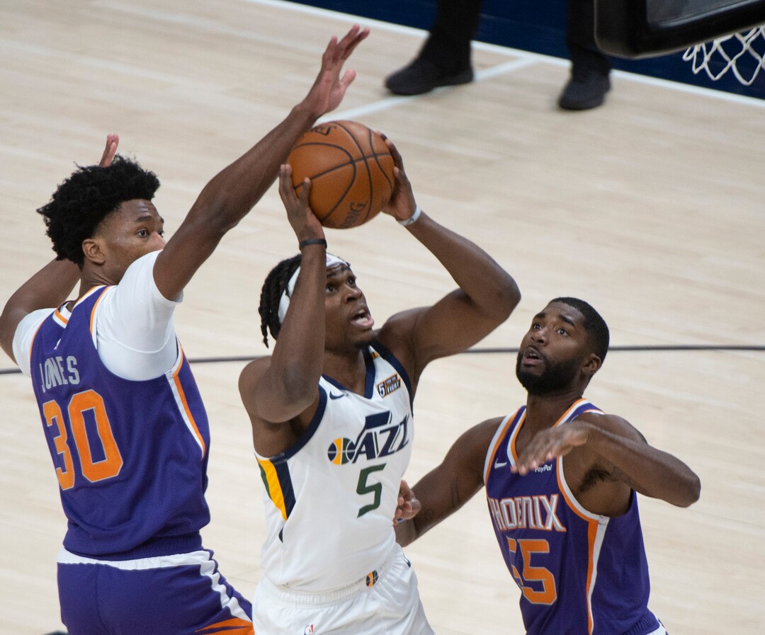 (Rick Egan | The Salt Lake Tribune)  Utah Jazz forward Jarrell Brantley (5) takes the ball to the hoop, as Phoenix Suns center Damian Jones (30) and Phoenix Suns guard E'Twaun Moore (55) defend, in preseason NBA action between Utah Jazz and Phoenix Suns at Vivint SmartHome Area, on Saturday, Dec. 12, 2020.