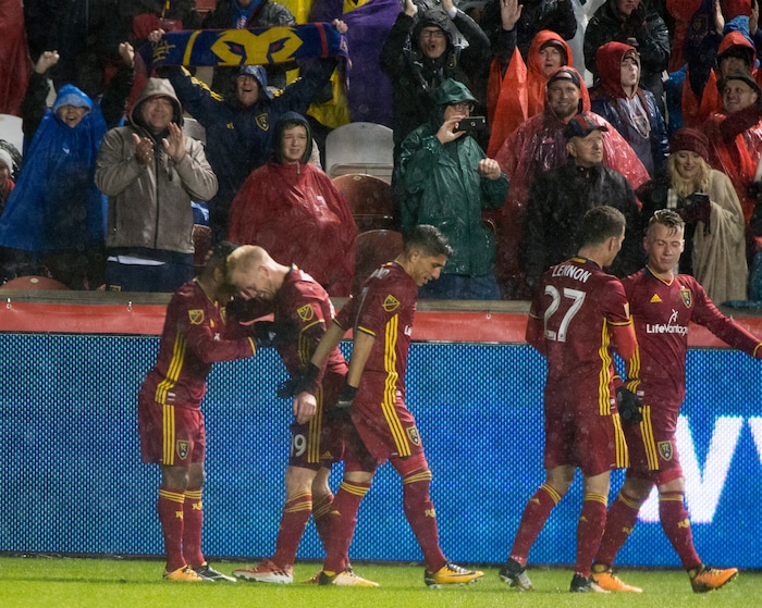 (Rick Egan  |  The Salt Lake Tribune)  Real Salt Lake celebrate with midfielder Luke Mulholland (19), after he scored a goal, in MLS soccer action, Real Salt Lake vs Seattle Sounders, in Sandy, Saturday, September 23, 2017.