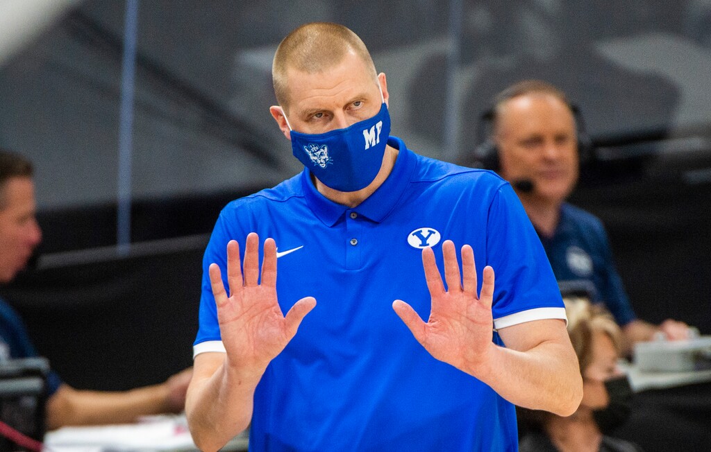 (Rick Egan | The Salt Lake Tribune) Brigham Young Cougars head coach Mark Pope gives instructions to his team, in basketball action between the Brigham Young Cougars and the Weber State Wildcats at Vivint Arena, on Wednesday, Dec. 23, 2020.