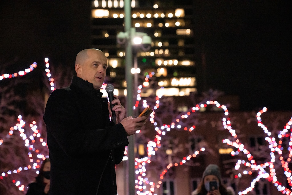 (Niki Chan Wylie for the Salt Lake Tribune) Evan McMullin speaks at a candlelight vigil for democracy at the Wallace F. Bennett Federal Building on Jan. 6, 2022.
