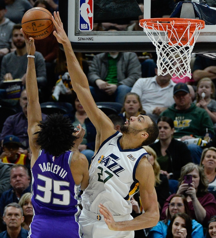 (Francisco Kjolseth  |  The Salt Lake Tribune)  Sacramento Kings forward Marvin Bagley III (35) is blocked by Utah Jazz center Rudy Gobert (27) as the Utah Jazz host the Sacramento Kings in their NBA game at Vivint Smart Home Arena Friday, April 5, 2019, in Salt Lake City.
