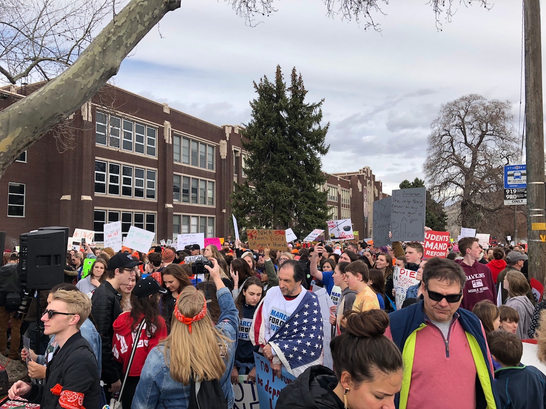 (Chris Detrick | The Salt Lake Tribune)  Participants hold signs during the March For Our Lives rally in Salt Lake City Saturday, March 24, 2018.