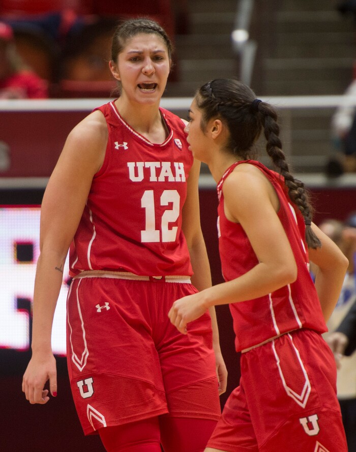 Rick Egan  |  The Salt Lake Tribune

Utah Utes forward Emily Potter (12) shouts its  Malia Nawahine (3), after Nawahine hit a 3-point-shot to tie the game, in Basketball action, Brigham Young Cougars vs. the Utah Utes, Saturday, December 10, 2016.