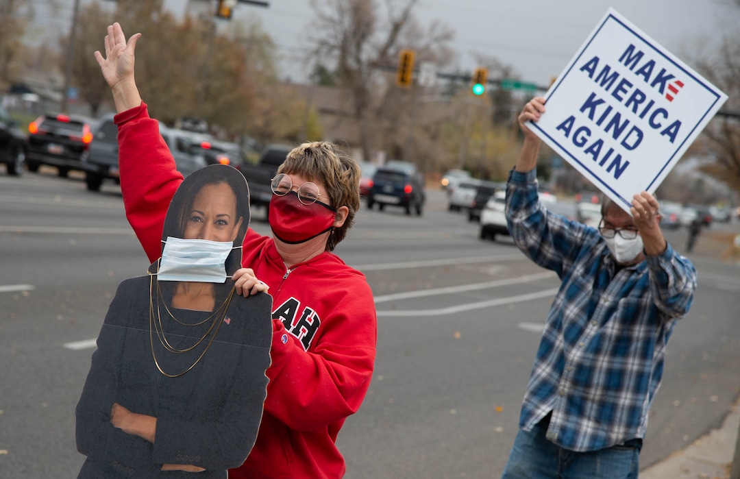 (Francisco Kjolseth  |  The Salt Lake Tribune) Vicki and Mike Wason join other supporters of President-elect Joe Biden as they celebrate at Liberty Park on Saturday, Nov. 7, 2020, in Salt Lake City.