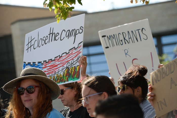 (Francisco Kjolseth  |  The Salt Lake Tribune)  Utah Jewish Community organizations, their members and friends gather outside of the U.S. Immigration and Customs Enforcement (ICE) field office at 2975 S. Decker Lake Drive in West Valley City, on Saturday, Aug. 10, 2019, for a Close The Camps vigil and to condemn government policies that endanger, imprison and deport immigrants, refugees and asylum seekers.