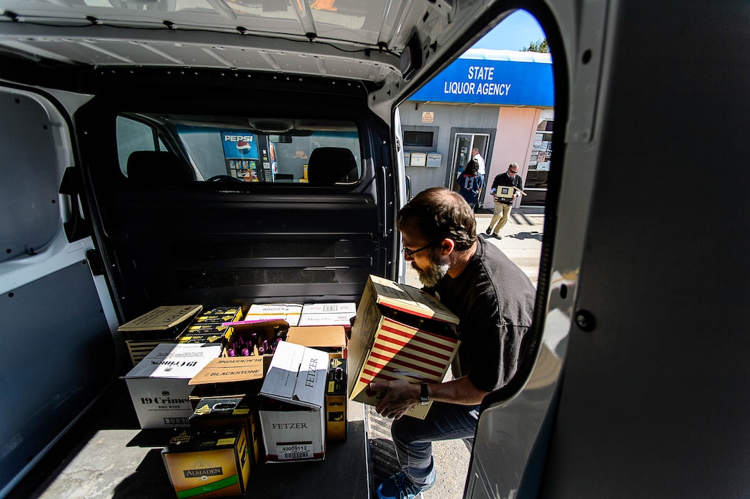 (Trent Nelson | The Salt Lake Tribune)  DABC employee Branden Hirst removes inventory from the package agency in Tremonton after routine audits showed a string of money losses and consumers lodged repeated complaints about stock availability, Tuesday, Sept. 26, 2017.