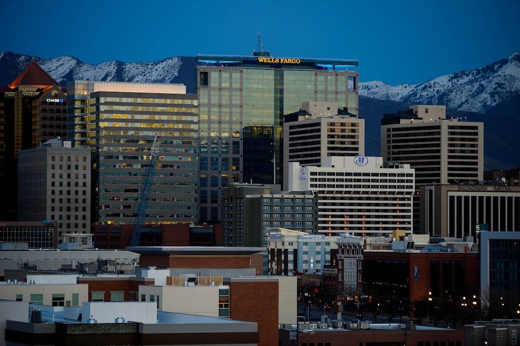 (Trent Nelson  |  Tribune file photo) The Salt Lake City skyline after sunset on Wednesday, April 8, 2020.