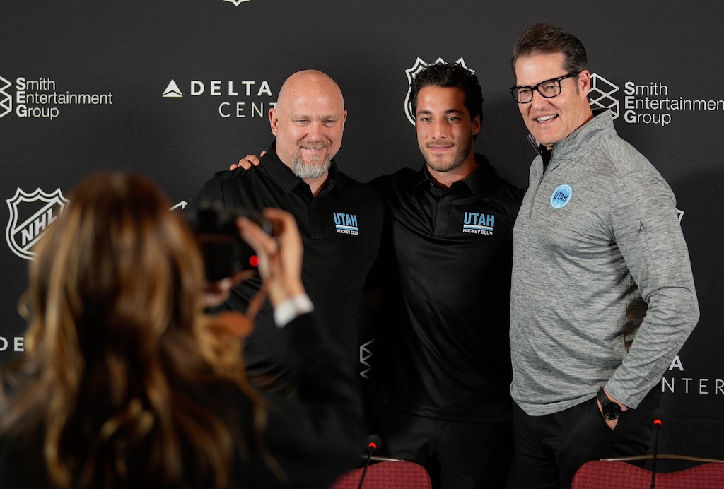 (Francisco Kjolseth | The Salt Lake Tribune) Utah Hockey Club Head Coach Andre Tourigny, defenseman Sean Durzi and Utah General Manager Bill Armstrong, from left, pose for a portrait during a press event at Hotel Park City to talk about Durzi's four-year contract signing on Monday, July 1, 2024.