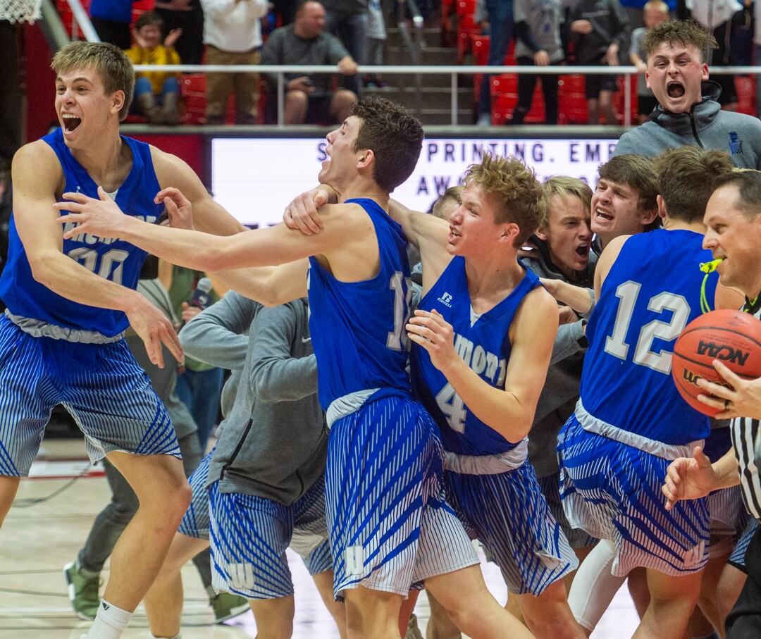 (Rick Egan  |  The Salt Lake Tribune)    The Fremont Silverwolves celebrate their 55-52 win over the Davis Darts, in the 6A basketball championship game at the Jon M. Huntsman Center, Saturday Feb. 29, 2020