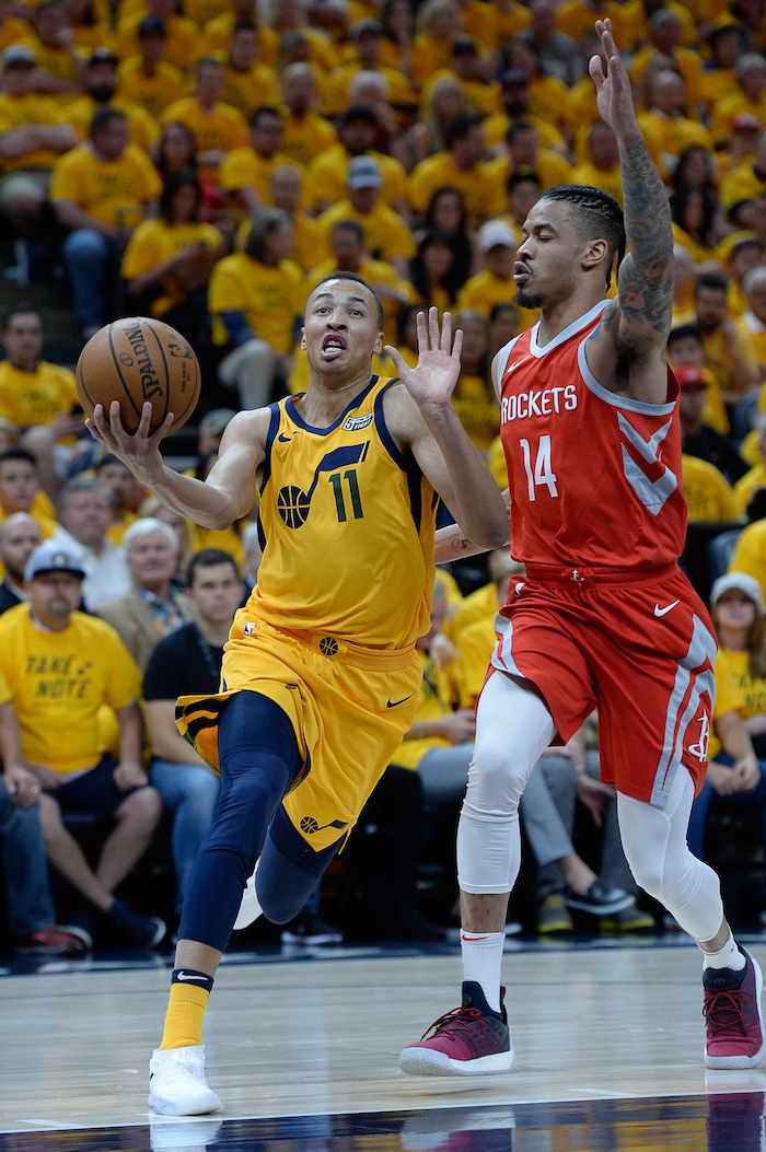 (Francisco Kjolseth | The Salt Lake Tribune) Utah Jazz guard Dante Exum (11) pushes past Houston Rockets guard Gerald Green (14) in the first half of Game 4 of the NBA playoffs at the Vivint Smart Home Arena Sunday, May 6, 2018 in Salt Lake City.