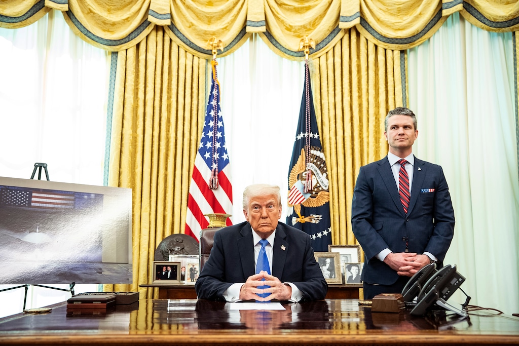 (Haiyun Jiang | The New York Times) President Donald Trump delivers remarks alongside Secretary of Defense Pete Hegseth in the Oval Office of the White House in Washington, March 21, 2025.