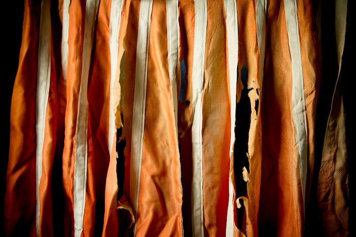 (Jeremy Harmon | The Salt Lake Tribune) A tattered skirt made out of parachute silk after WWII is seen at the Fort Douglas Military Museum on Feb. 6, 2019. Items like it were made after WWII in part because parachute factories in Manti led to locals having a glut of silk after the war.