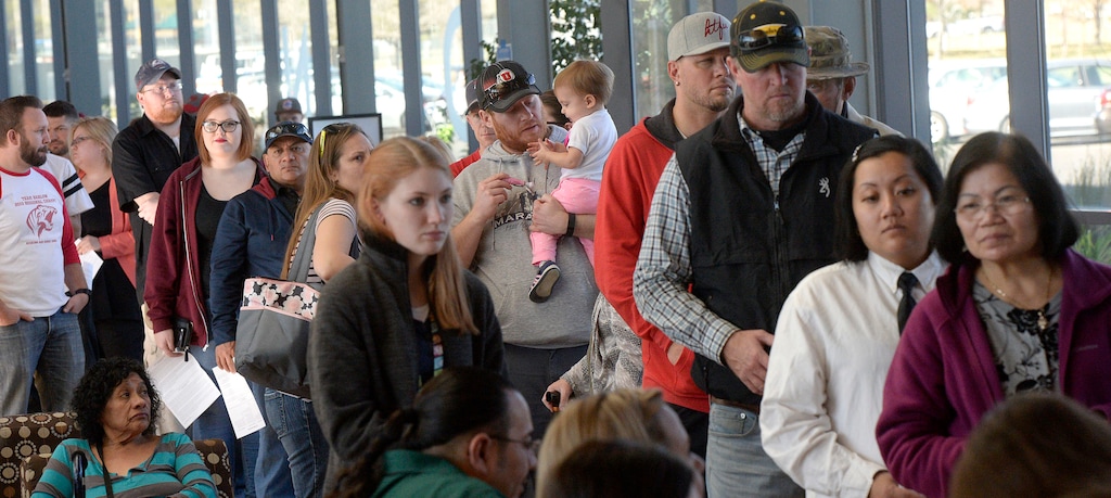 (Al Hartmann  |  Tribune file photo)
People line up at the polling station at West Jordan Library on Election Day, Nov. 8, 2016. Polling staff said they were very busy with people showing up beginning at 6:30 a.m. before opening with waits up to two hours midmorning.