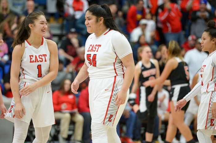 (Leah Hogsten  |  The Salt Lake Tribune)  East's Desarae Falatea and East's Lani Taliauli (54) celebrate play in the final moments of the game. East defeated Timpview 68-48 to win the the 5A High School Girls' Basketball Tournament title at SLCC in Taylorsville, Saturday, Feb. 24, 2018. 