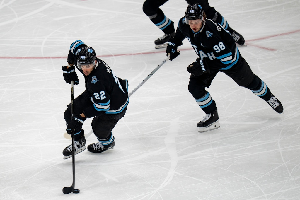 (Rick Egan | The Salt Lake Tribune) Utah Hockey Club center Jack McBain (22) and Utah Hockey Club defenseman Mikhail Sergachev (98),  in NHL action between the Utah Hockey Club and the San Jose Sharks, at the Delta Center, on Friday, Jan 10, 2025.