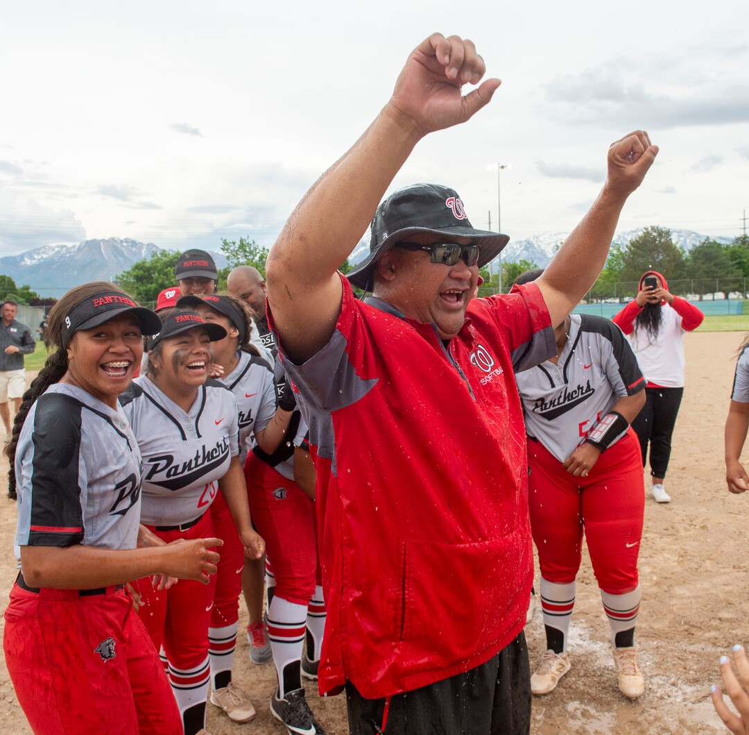 (Rick Egan  |  The Salt Lake Tribune)     West High head coach Keith Lopati reacts after getting drenched with water as the Panthers celebrates their 5A State Championship win over the Bountiful Braves, in Taylorsville, Thursday May 30, 2019