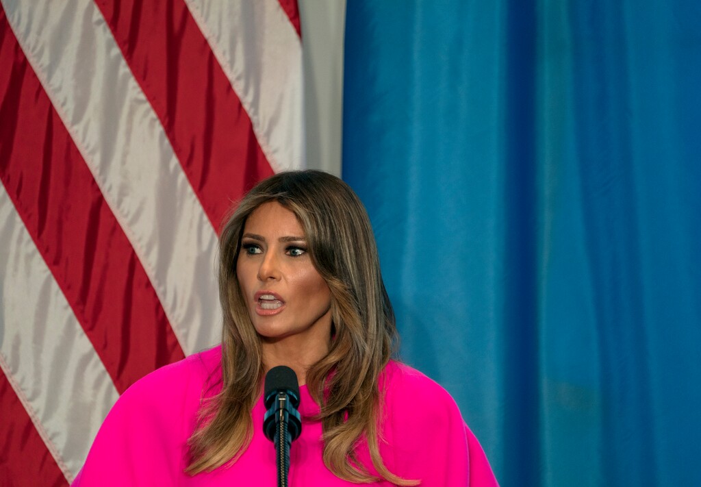 FILE - In this Sept. 20, 2017, file photo, first lady Melania Trump addresses a luncheon at the U.S. Mission to the United Nations in New York. Trump "hates" to see families separated at the border and hopes "both sides of the aisle" can reform the nation's immigration laws, according to a statement Sunday, June 17, 2018, about the controversy over separation of immigrant parents and children at the U.S.-Mexico border. (AP Photo/Craig Ruttle, File)
