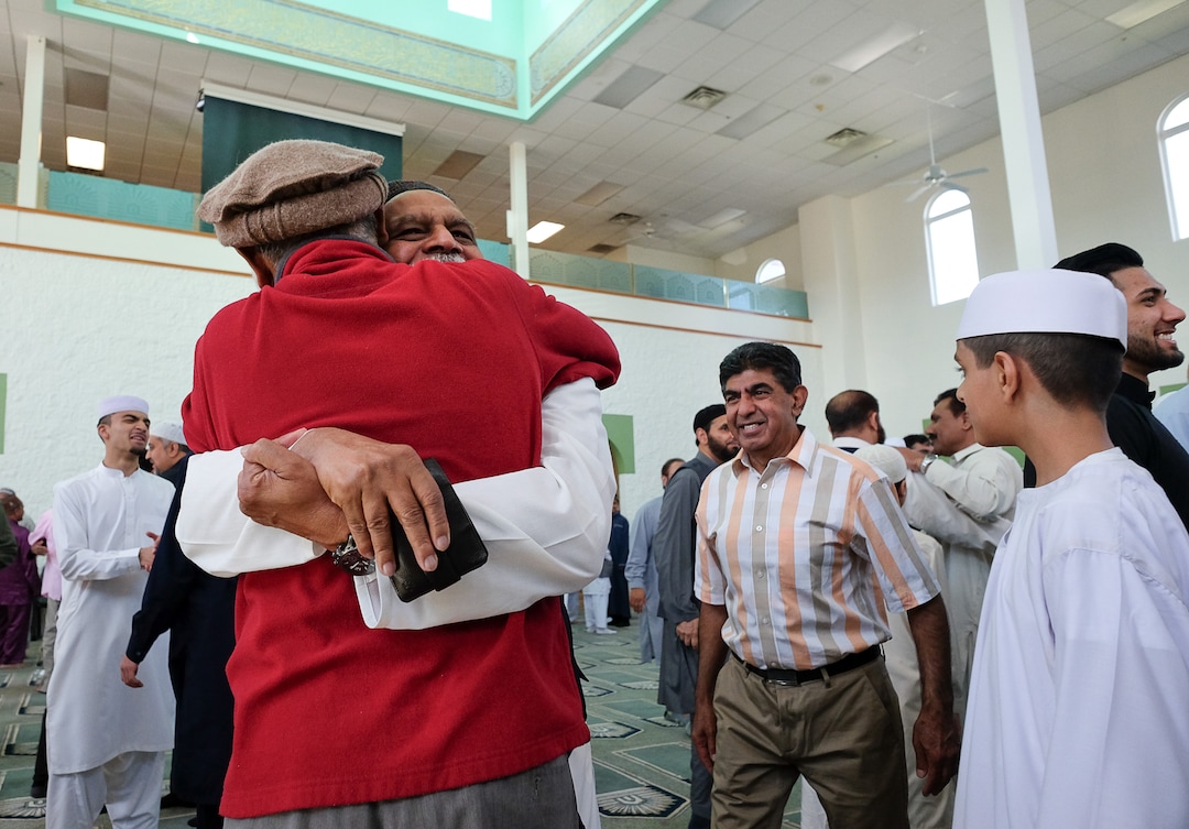 (Francisco Kjolseth  |  The Salt Lake Tribune)  Men of the Khadeeja Islamic Center in West Valley City exchange warm embraces with one another as they mark the end of Ramadan, a 30 day period of fasting and spiritual growth. It's the biggest religious holiday of the year for Muslims as hundreds from the Wasatch Front gather for the Eid the Òfestival of the breaking of the fast,Ó Wed. June 5, 2019.