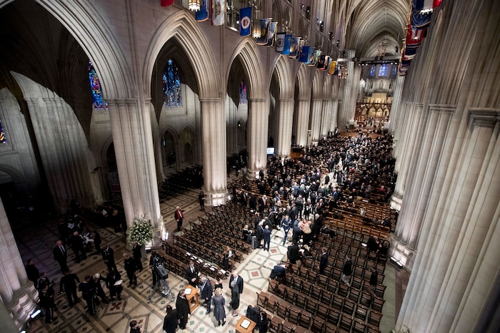 People arrive for a State Funeral for former President George H.W. Bush at the National Cathedral, Wednesday, Dec. 5, 2018, in Washington. (AP Photo/Andrew Harnik, Pool)